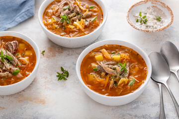 Cabbage and potato soup with pulled pork