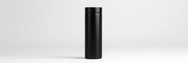Obraz premium Modern sleek black thermos bottle isolated on a clean white backdrop studio