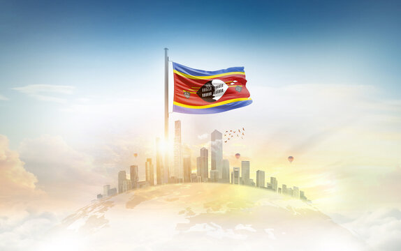 Eswatini flag wavering on globe with modern building skyline. Flag waving on world map. Eswatini national flag for independence day. - Powered by Adobe