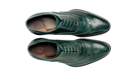 Pair of stylish green leather brogue shoes isolated on transparent background