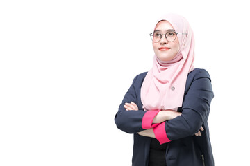 Smiling cute young asian muslim woman in hijab light clothes posing isolated on white background studio portrait. People religious Islam lifestyle concept. Mock up copy space. Holding hands crossed