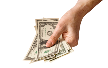 Hand holding US dollars cash money isolated cutout on transparent
