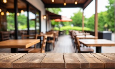 Fototapeta premium Rustic Wooden Tabletop with Blurred Outdoor Cafe Background
