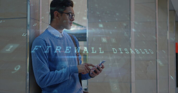 In office, man using smartphone with digital firewall disabled, cybersecurity focus