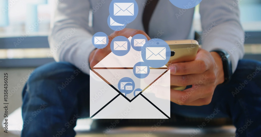 Poster man using smartphone, sending emails, multitasking in modern office environment