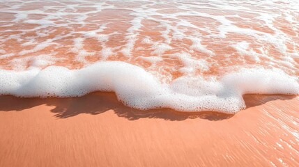 Coral beach wave foam close up