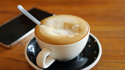 Sweet coffee being stirred symbolizing sugar addiction and daily craving for sweet taste Sugar in every cup highlights need for sugar boost Sugar dependency shown through habitual coffee consumption