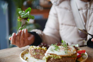 Delicious avocado toast served at a cozy cafe during brunch time