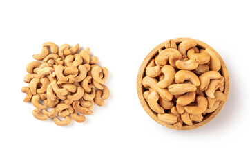 Roasted cashew nuts in wooden bowl on a white background.  top view