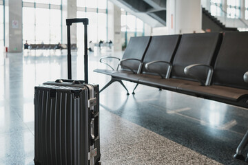 Modern Airport Scene Featuring a Sleek Suitcase Ready for Travel