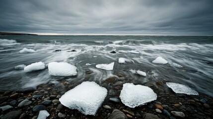 Dynamic ocean waves crash against icebergs coastal shoreline photograph dramatic environment wide angle nature's power