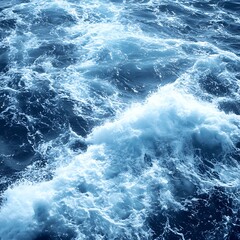 Fototapeta premium Turbulent ocean waters with cresting waves displayed in shades of blue
