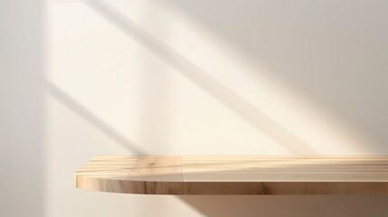 Empty wooden table with light rays of sunlight on a white wall background for product display presentation mockup design.