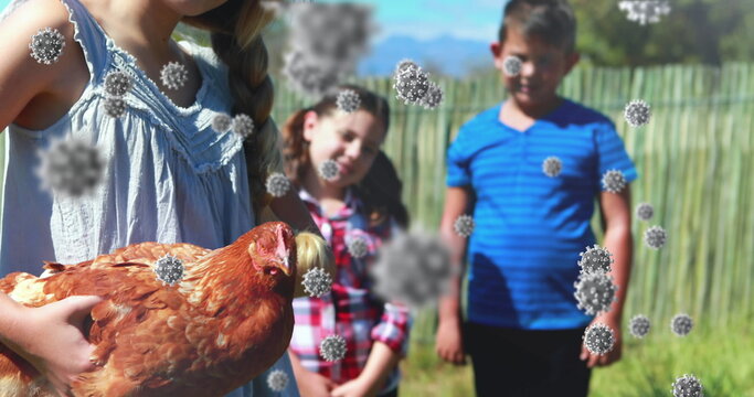 Children observing chicken outdoors with virus particles floating in air - Powered by Adobe