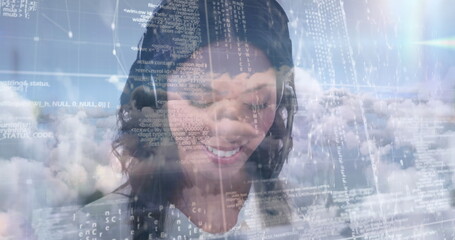 Image of businesswoman talking on phone headset with data processing against sky with clouds