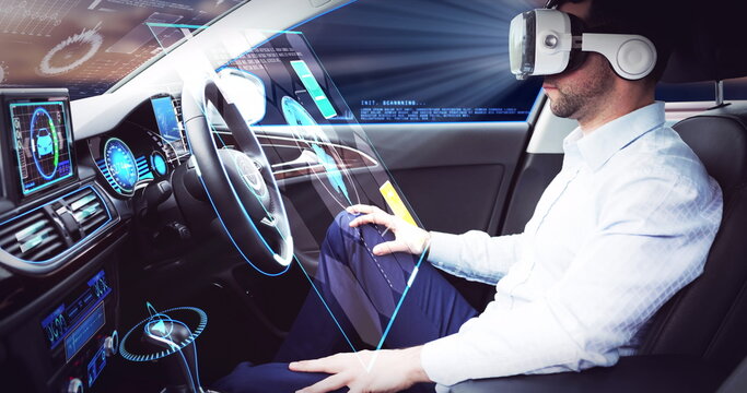 Image of interactive screen over businessman wearing vr headset in self driving car