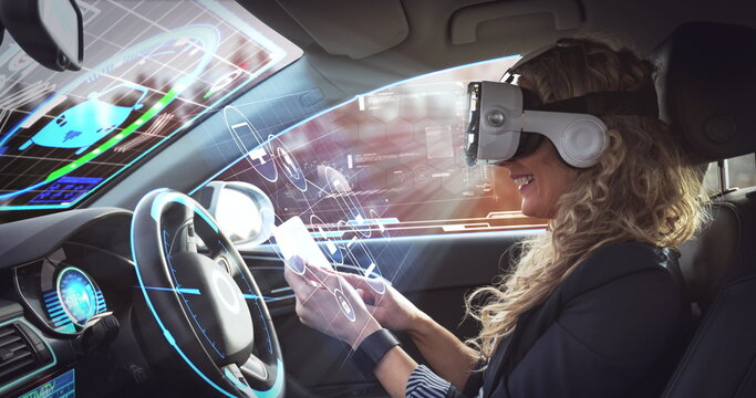 Image of digital interface over woman wearing vr headset in self driving car