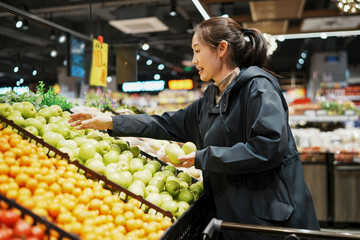 Fresh Produce Shopping Experience in a Modern Supermarket