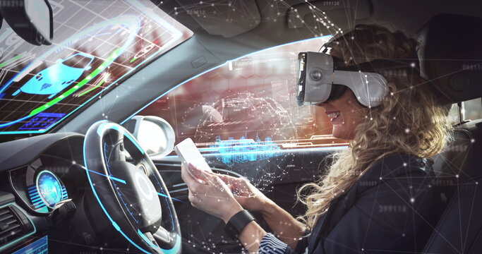 Image of 3d cityscape over woman wearing vr headset in self driving car