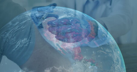 Image of globe with midsection of doctor giving vaccination to patient