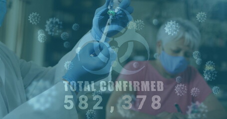 Image of biohazard symbol with total confirmed rising numbers and doctor preparing vaccination