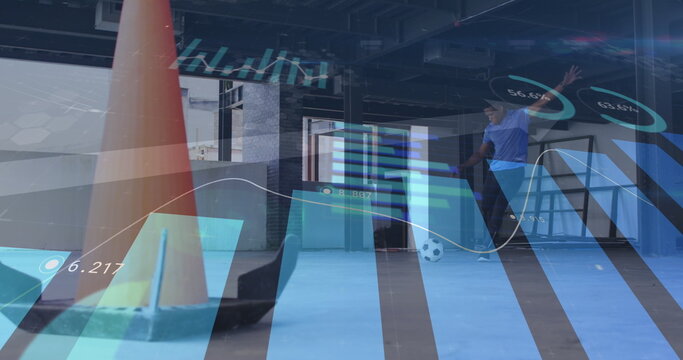 Image of statistics and graphs over man playing football