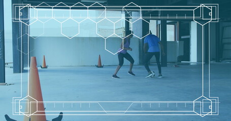 Digital interface with hexagonal shapes against african american woman and man playing soccer