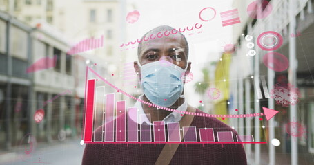 Image of covid 19 statistics over african american man wearing face mask on city street