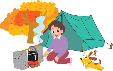 秋のキャンプでハンゴウ炊飯するお母さんと犬
