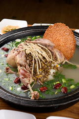 Duck boiled in a black pot, nurungji soup