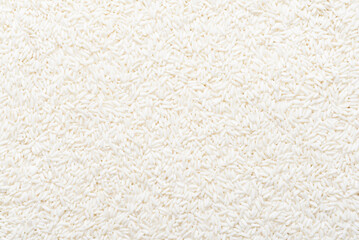 Texture background of glutinous rice grains from local agricultural in Thailand