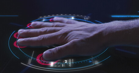 Image of man's hand touching interactive screen reading fingerprints and data processing