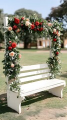 Obraz premium Floral-adorned white bench in park setting