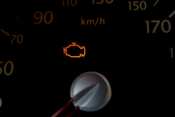engine malfunction light on the dashboard of a car