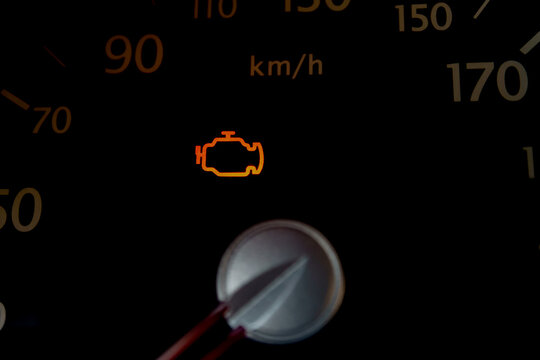 engine malfunction light on the dashboard of a car