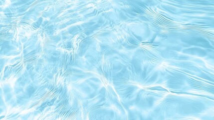 Obraz premium Stunning image of serene aqua waves and rippling water surface creating a peaceful and calming natural background with shimmering light reflections