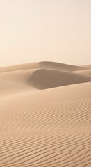 A serene sandy dune landscape featuring smooth, flowing curves and soft, natural lighting. The neutral tones create a calming and minimalistic aesthetic, perfect for backgrounds, nature themes