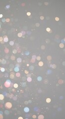 A dreamy, soft-focus bokeh effect featuring tiny, blurred pastel-colored lights scattered across a neutral background. Ideal for elegant designs, photography overlays, and artistic compositions