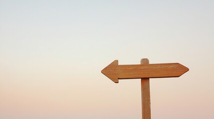 Wooden Arrow Signpost Against Gradient Sky, Symbolizing Direction and Simplicity
