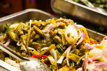 Pickled vegetable salad with Mexican nopales at the Atlixco food market in Mexico.