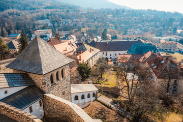 Obraz premium Historical town square in mining city Kremnica in Slovakia. View of the tower and church on the Kremnica castle.