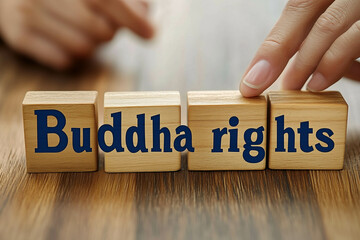  A photo of the text "Buddha" on the right and left, wooden blocks with hand icons on them spelling out the word "rights" in blue letters