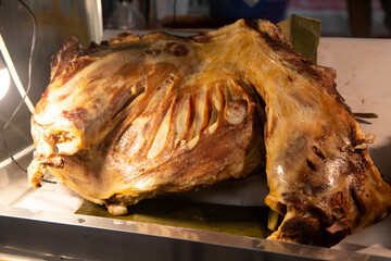 Large pieces of roasted lamb at the Atlixco market in Puebla, Mexico.