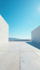 Vast empty concrete ground with clear blue sky above,  tranquil,  open space
