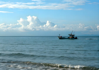 Obraz premium fishing boat in the sea