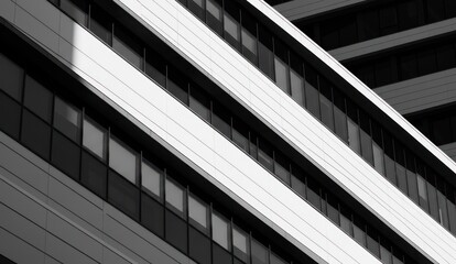 Modern building facade with geometric shapes in black and white,
