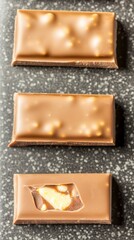 Fototapeta premium Close-up of a chocolate bar with a bite taken out, showcasing the richness and artistry of bean-to-bar chocolate