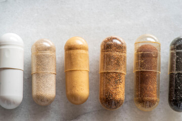 Close-up of medicines or food supplements used to treat oneself or to illustrate medicine