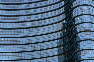 Modern glass facade in Milan.
