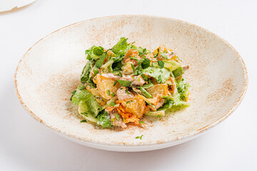 Crisp greens mixed with savory chicken and a tangy dressing create a delightful dish